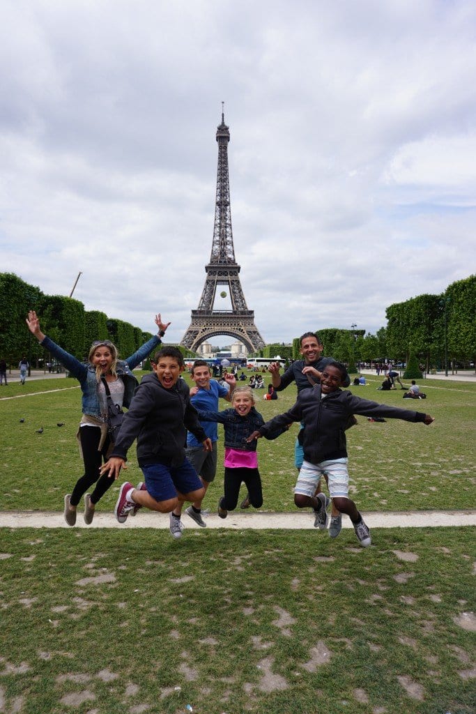 eiffel_tower_family_jumping_excited_paris_france