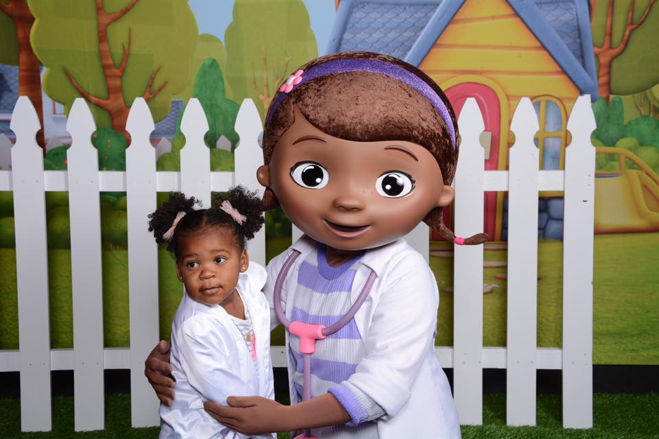 Little Black Girl with Doc McStuffins Character