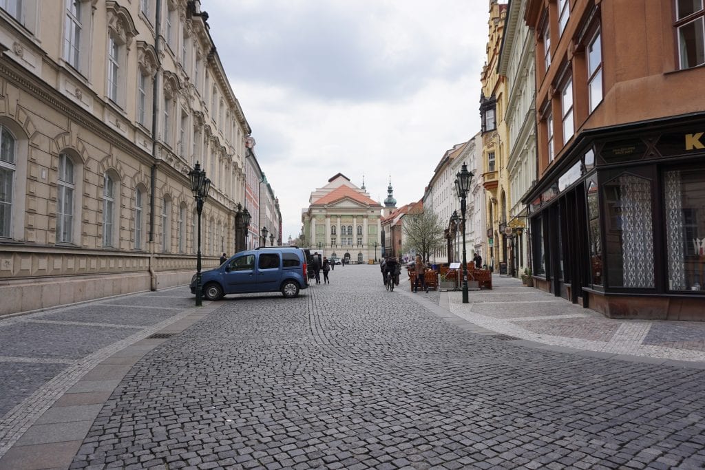 Gorgeous cobblestone street in Prague, at end is the theater Mozart played in. Global Munchkins