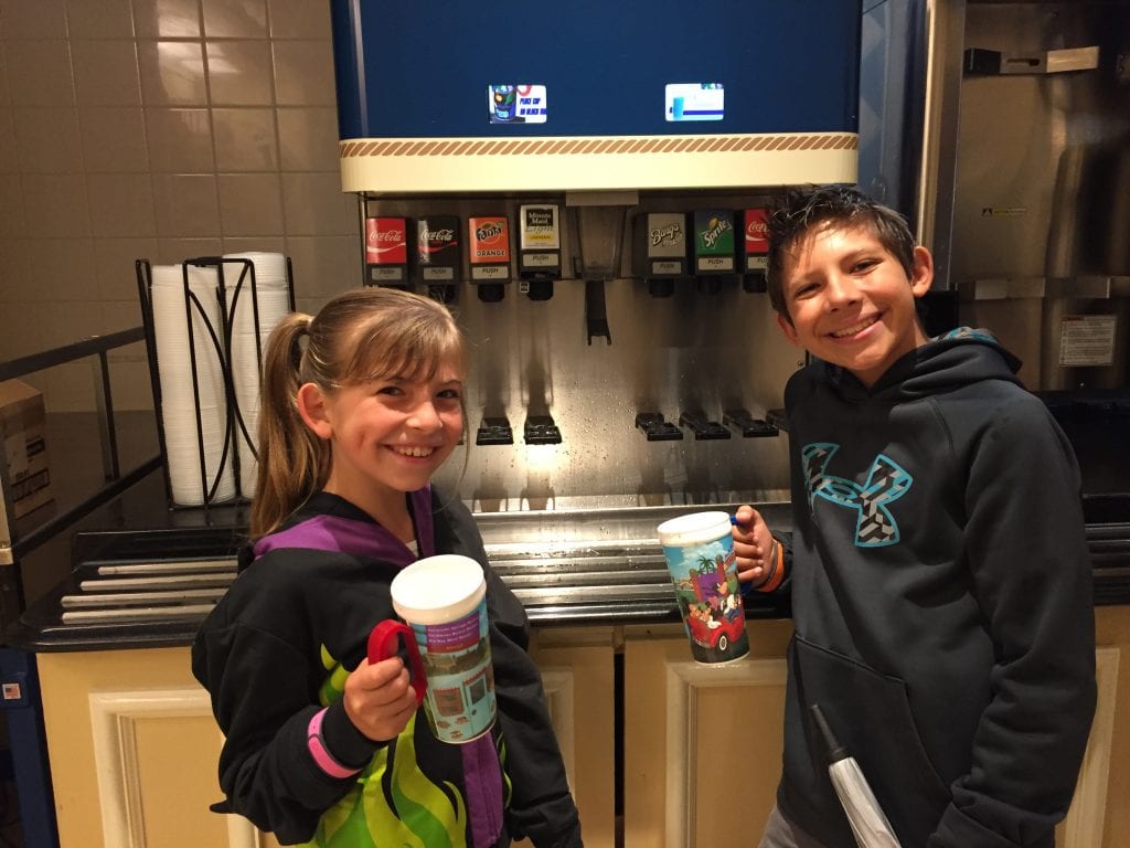 Kids with their Refillable Mugs Disney Resort | Global Munchkins