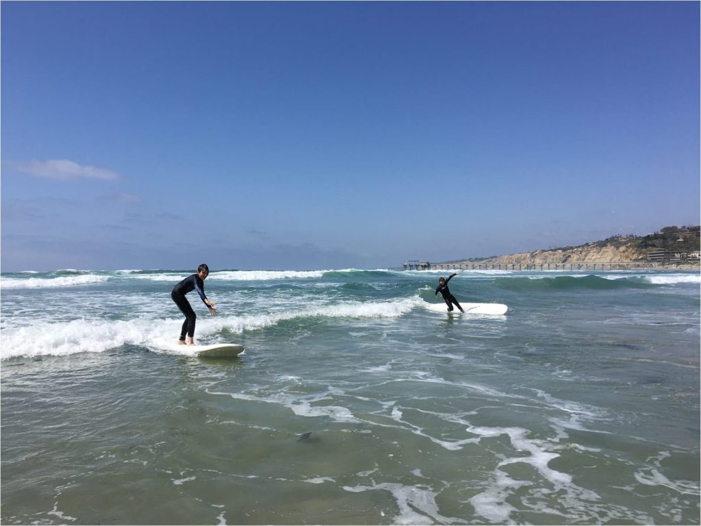 Boys surfing in California THE LEO LOVES San Diego Lifestyle Family Photographer Erin Oveis Brant