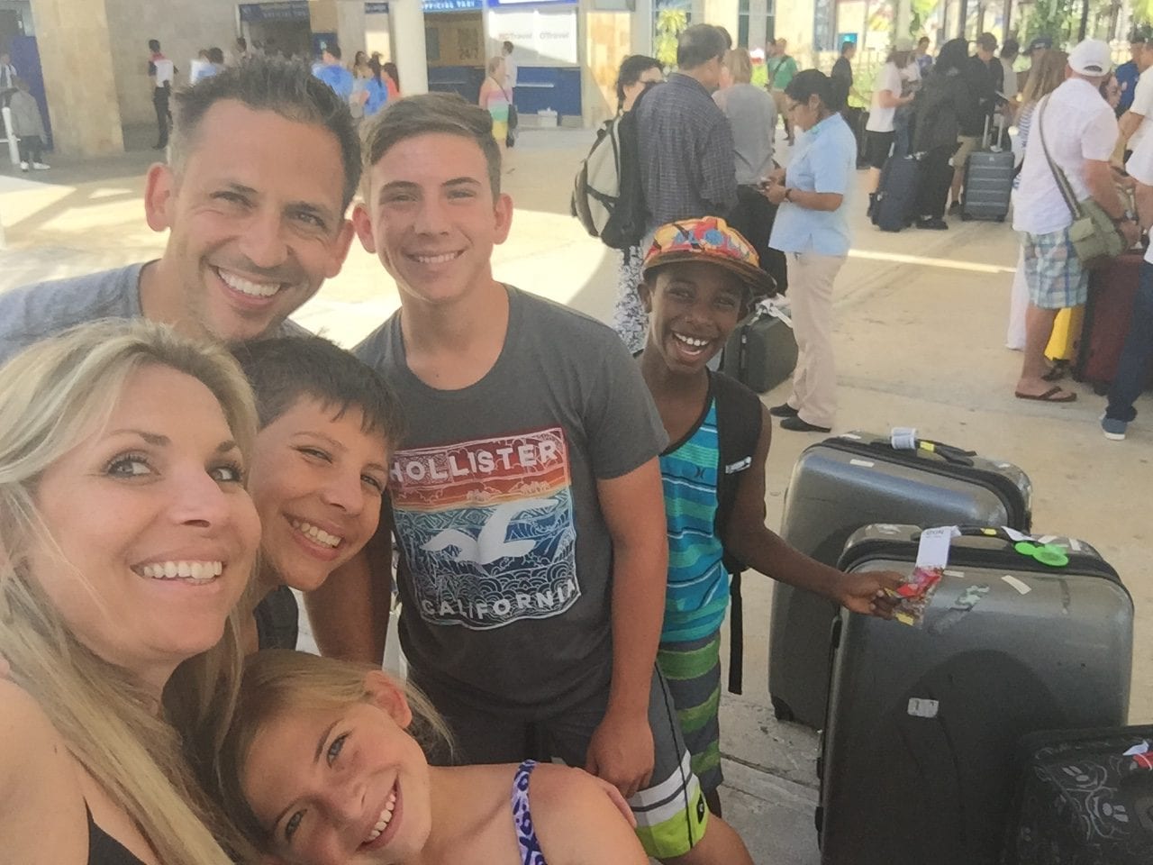 Happy family at the Cancun airport