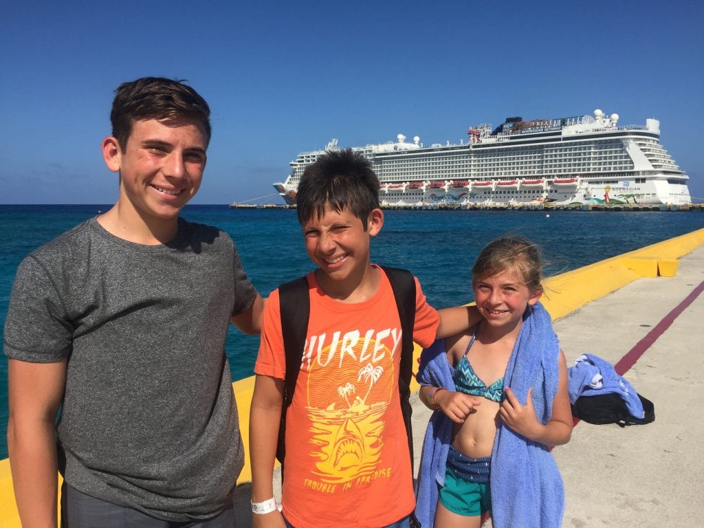 Family at port in Costa Maya with Cruise Ship behind