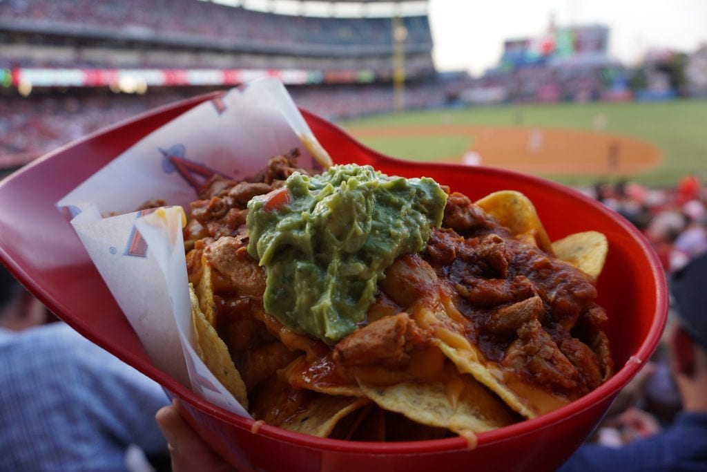 Delicious helmet nachos while watching a baseball game at the Anaheim Angels Stadium | Global Munchkins