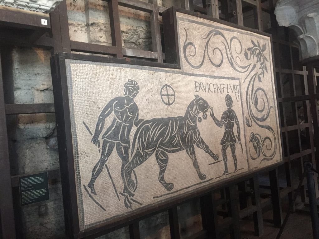 Find art like this mosaic found in the Colosseum when you travel to Rome with Kids | Global Munchkins