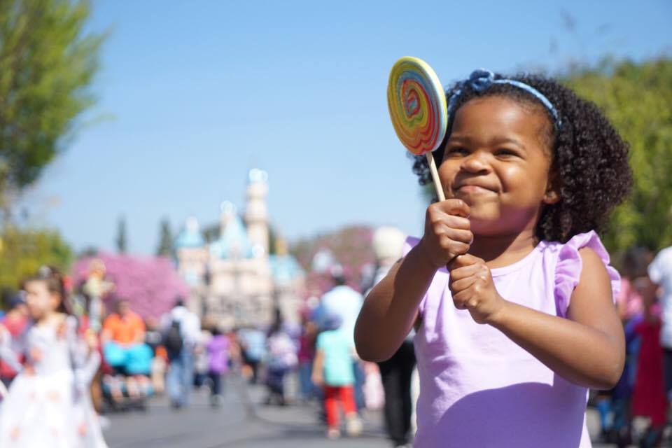 Girl with Lollipop at Disneyland