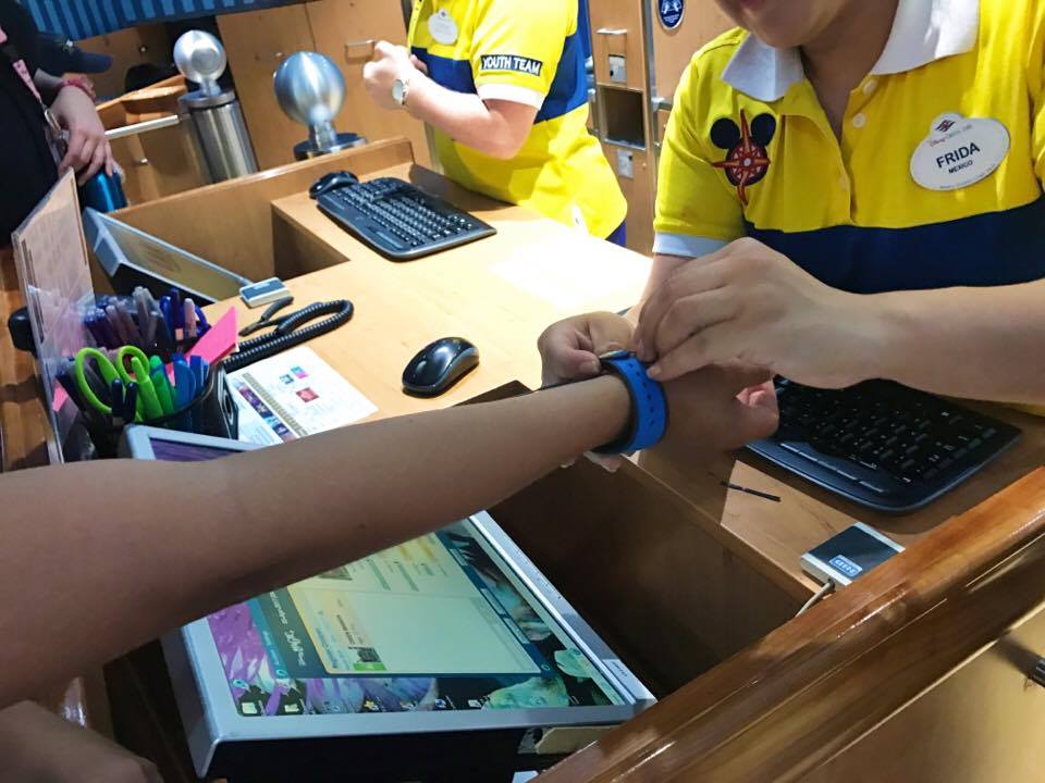 Getting magic band for Oceaneer's Club onboard the Disney Magic. Disney Cruise Line