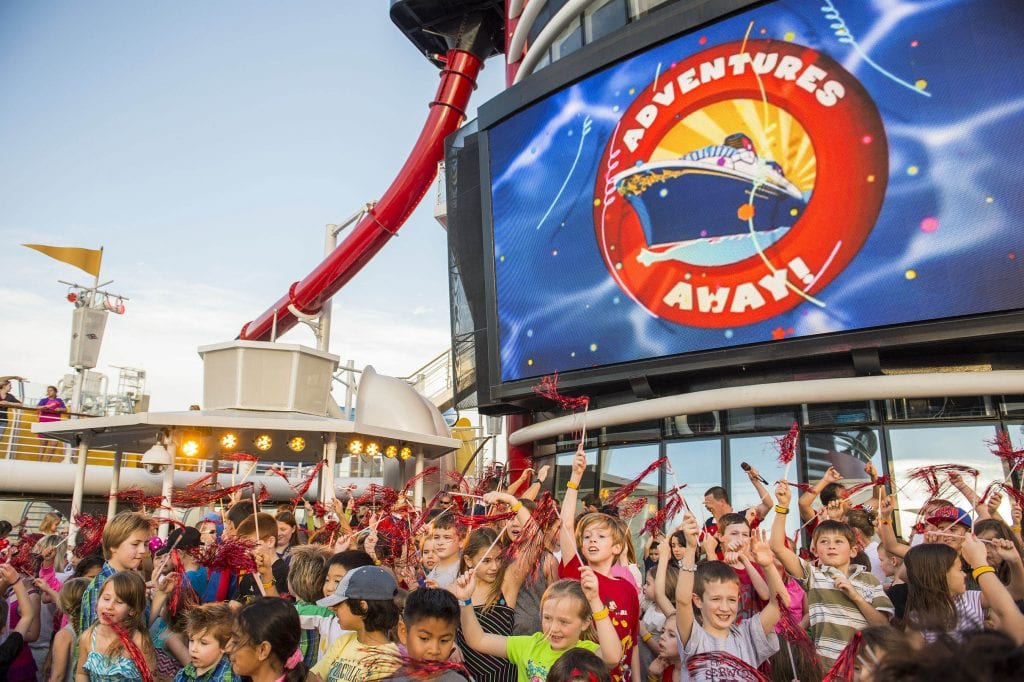 “Adventures Away,” an extra-special celebration on the upper decks, signals the official start of magical vacation on the Disney Magic. Deck parties aboard Disney Cruise Line are designed to entertain all ages with high-energy music, dancing, special effects and appearances by the Disney characters. (Matt Stroshane, photographer)