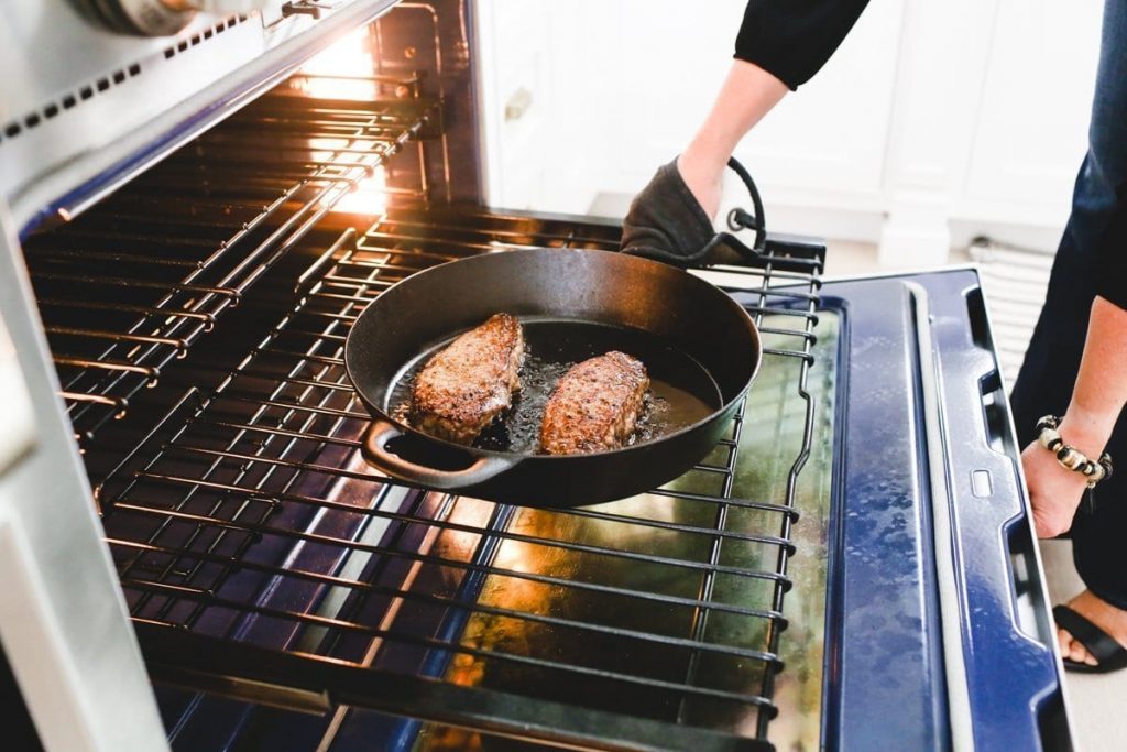 Pan Seared New York Strip Steak Recipe featuring Omaha Steaks NY Strips. Cooked in a cast iron skillet.