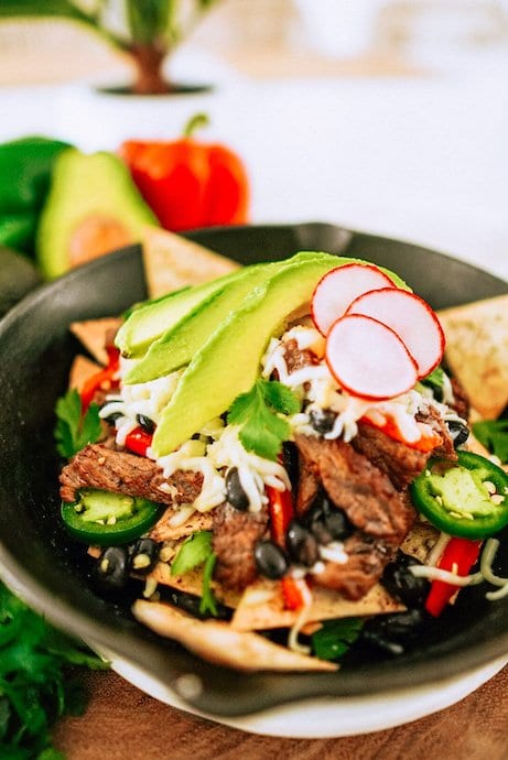 gorgeous cast iron skillet with steak keto nachos