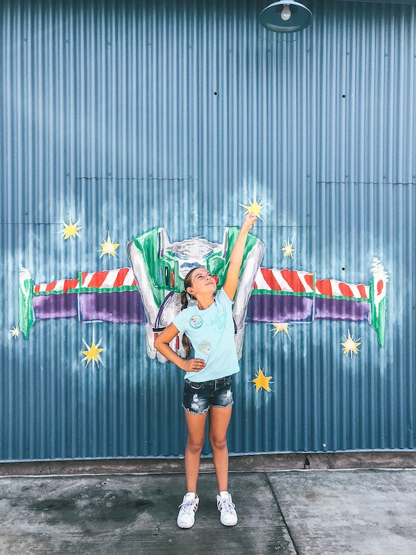 Disneyland tips - take pictures in front of fun Disneyland Walls