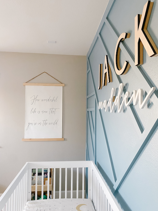 Geometric wall in baby's nursery. Modern design