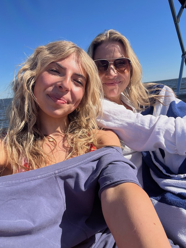 woman and teenager on pontoon boat in 30A