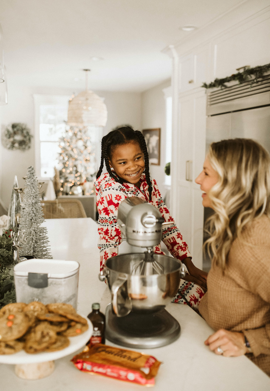 mom and daughter making cookies 