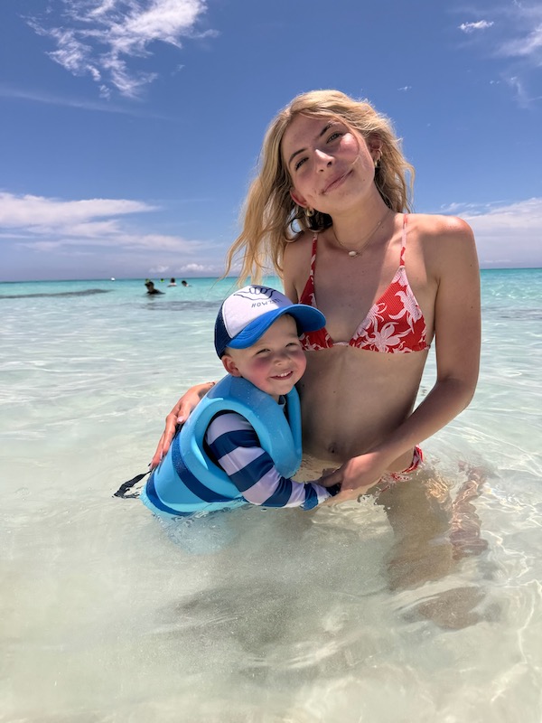 Ella and Jack in the water at the beach on Lookout Cay