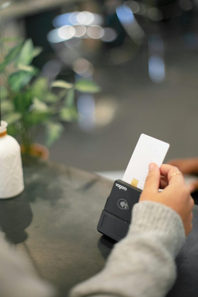 Don't Know How to Use Miles? PointsYeah Will Do It For You 1 woman swiping credit card