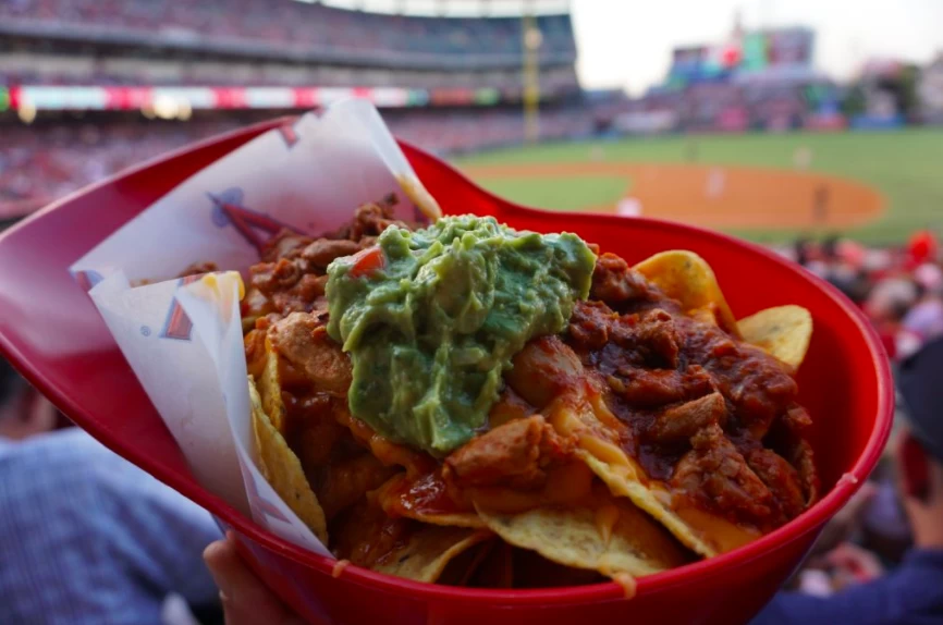 33 Amazing Things To Do in Anaheim Beyond Disneyland 6 Delicious helmet nachos while watching a baseball game at the Anaheim Angels Stadium | Global Munchkins